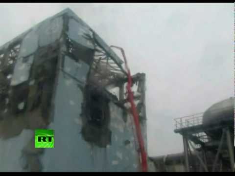 Fresh close-up video of Fukushima destroyed reactor, firefighters at plant